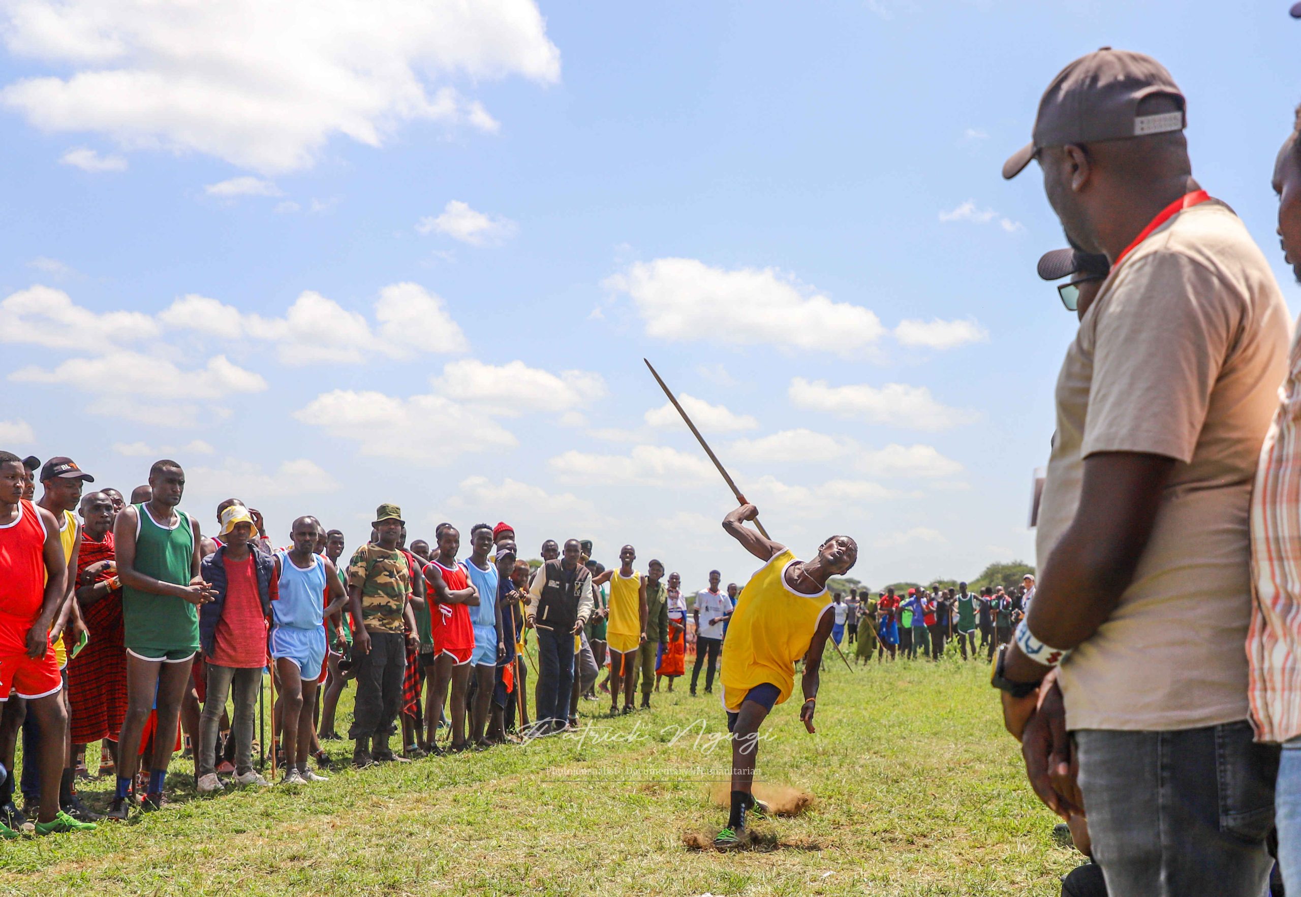 A Maasai Moran throwing a Javelin spear during the Maasai olympics 2024