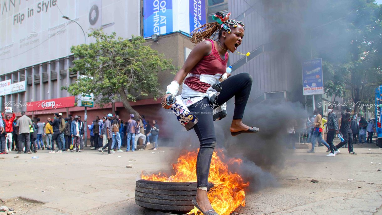 A young lady protesting in the streets of Nairobi